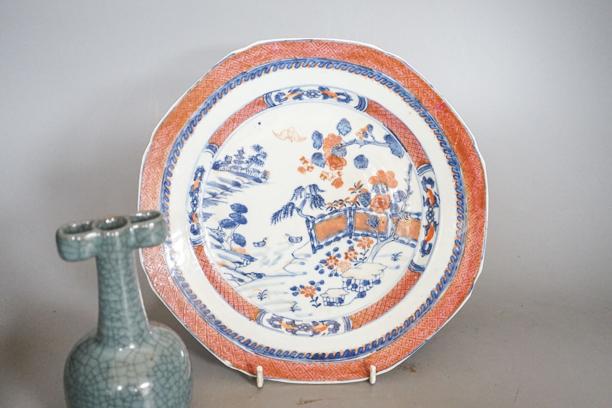 An 18th-century Chinese famille rose small vase, a similar octagonal plate, a 19th-century Cantonese dish and a crackle glaze arrow vase, tallest 15cm